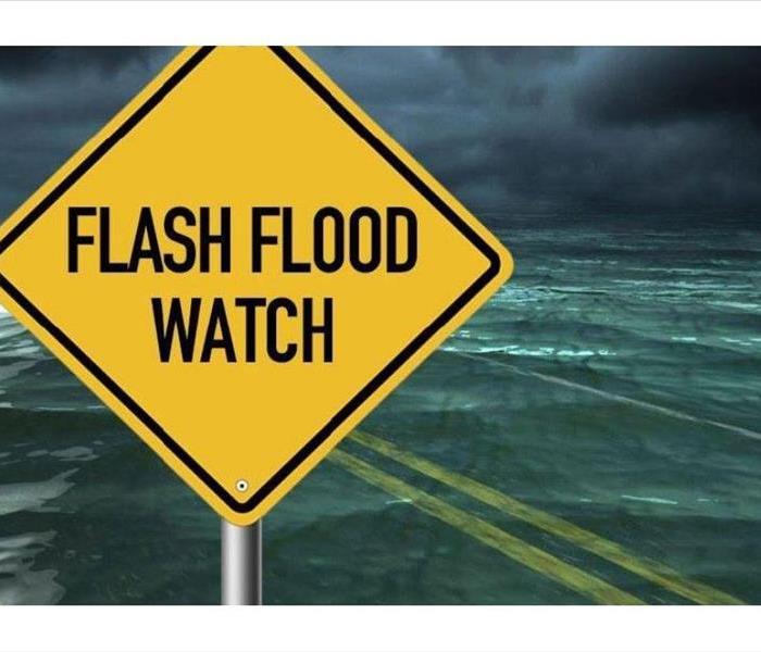 A flash flood warning sign